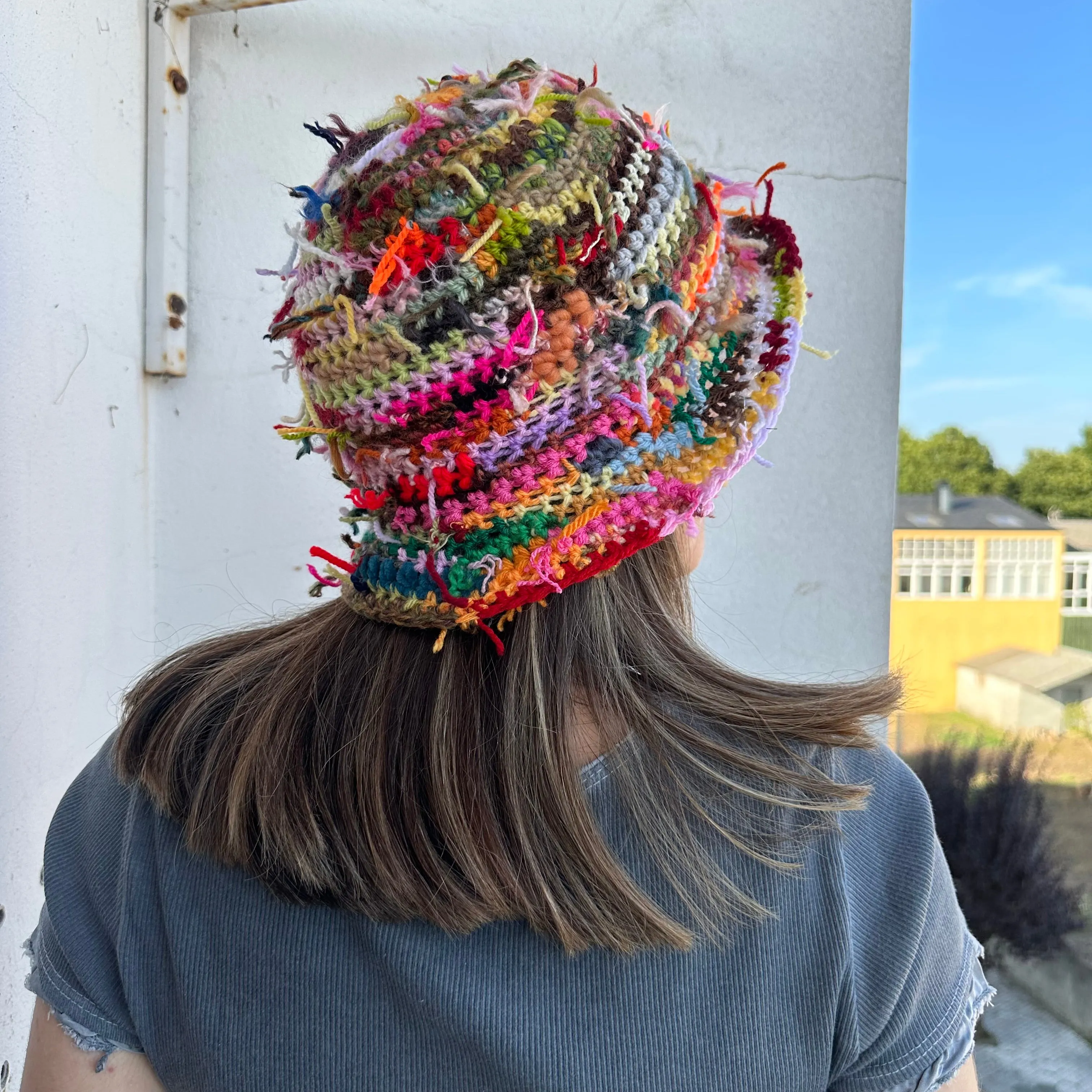 1 of 1 handmade crochet bucket hat made from leftover scraps of yarn