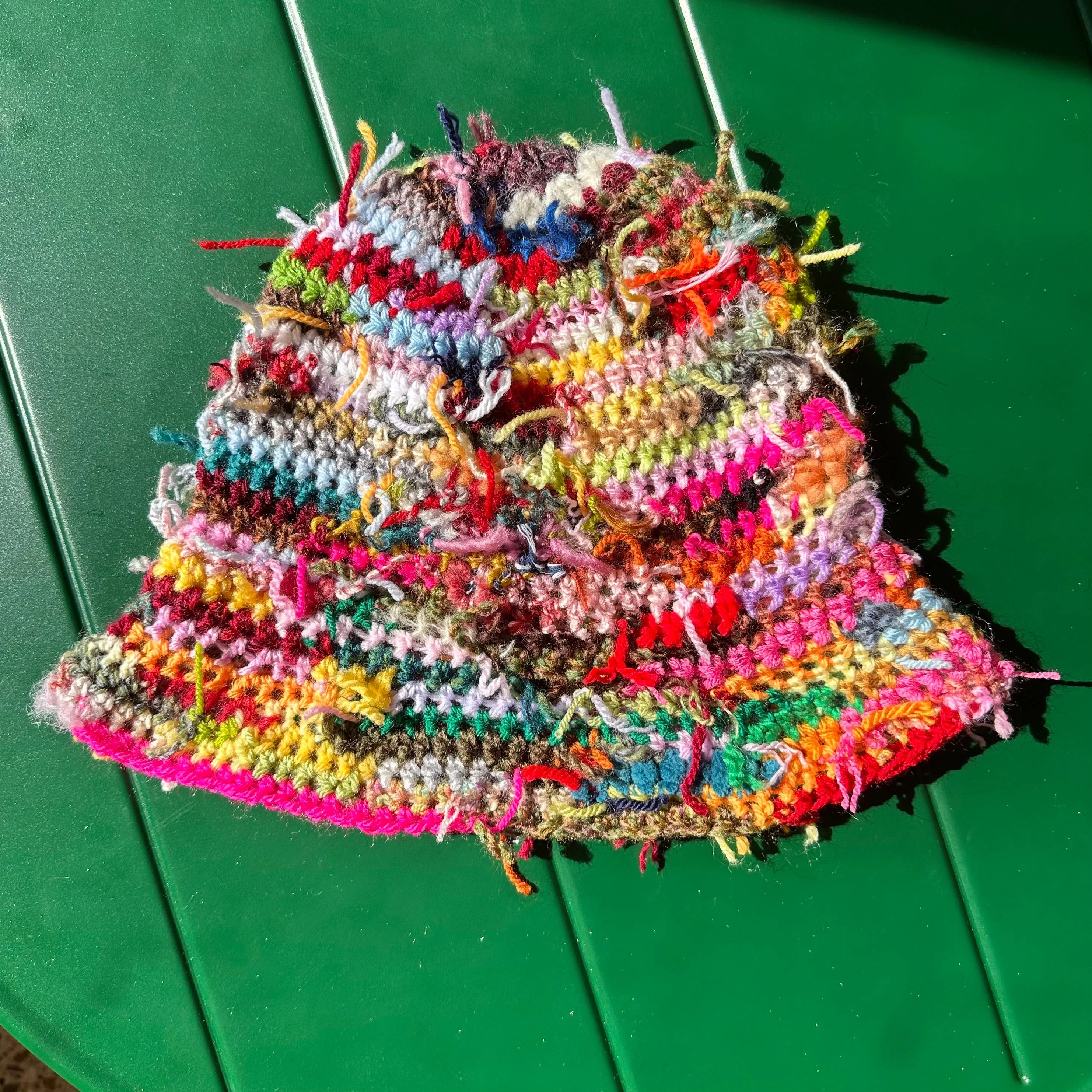 1 of 1 handmade crochet bucket hat made from leftover scraps of yarn